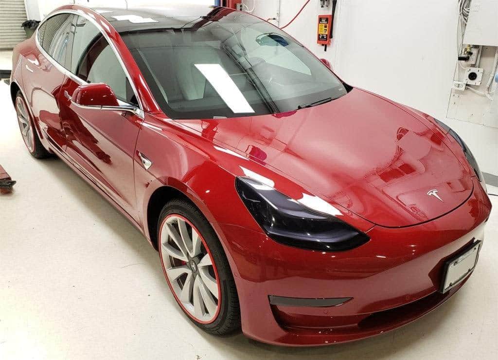Model 3 - CP Gold Headlight paint protection film installed on Tesla Model S, 3, X, Y at Speed Projects Laboratory In Richmond.
