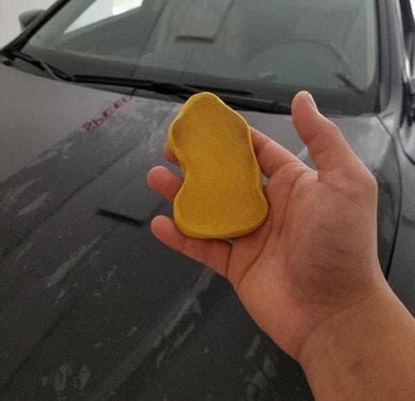 The Man Is Holding Clay In His Hand