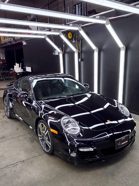 Restored black 2011 Porsche 911 Turbo S at Speed Projects Laboratory Richmond